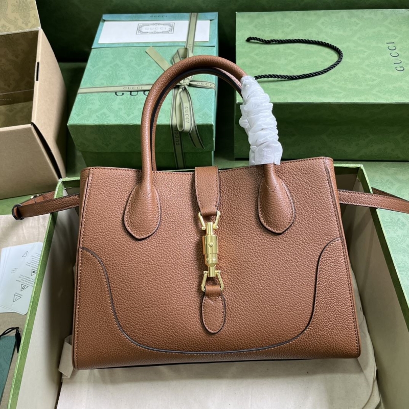 G*u*i top handle bags
